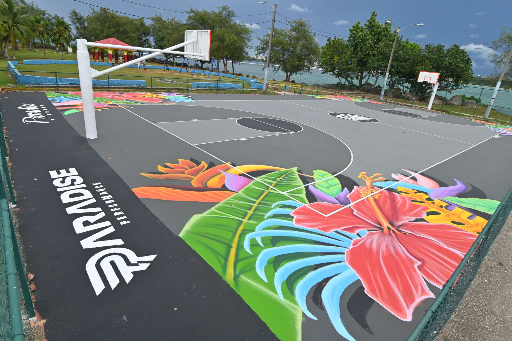 Paseo basketball court sports new, tropical mural